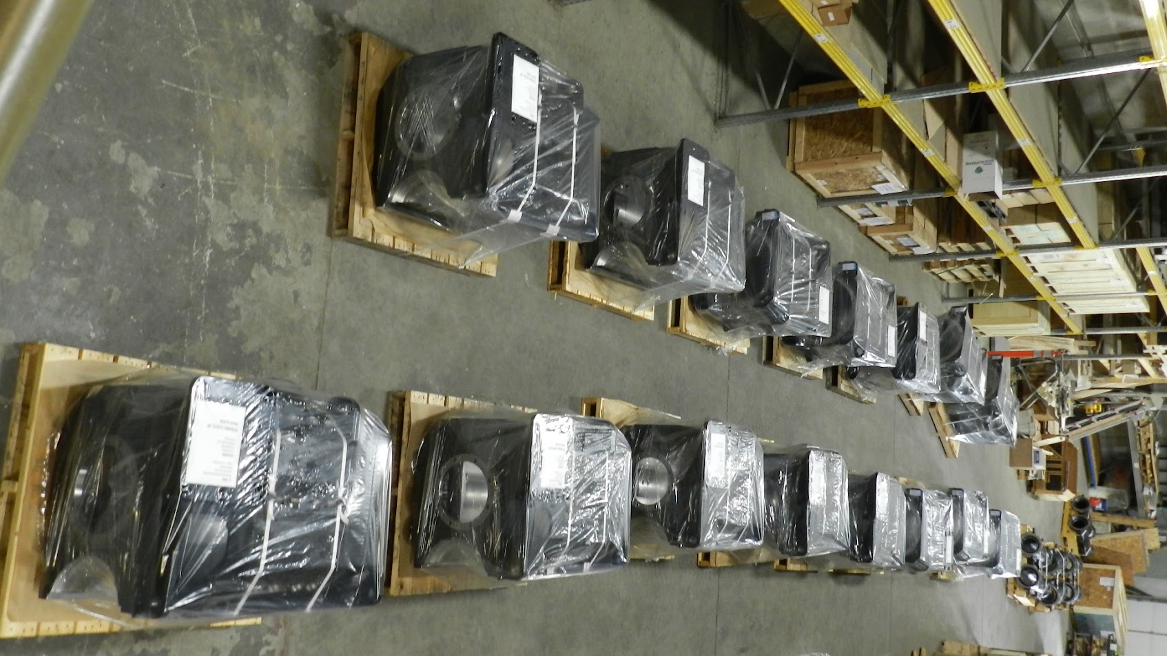 Traction motor components wrapped and palletized in rows